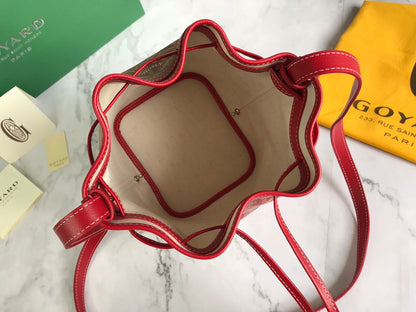 SAC SEAU PETIT FLOT 22 EN TOILE GOYARDINE ROUGE CLASSIQUE ET BORDURE EN CUIR D'AGNEAU