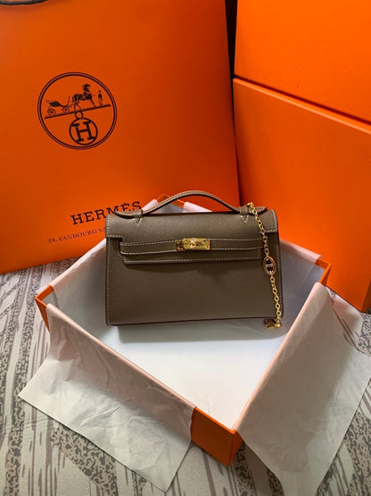 HM KELLY MINI POCHETTE 22 EPSOM MARRÓN CENIZA