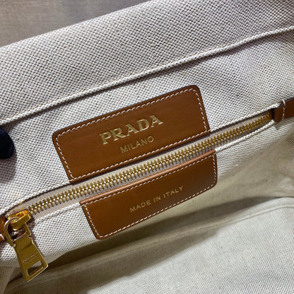 BOLSO TOTE 33 DE LONA BLANCA Y ASA DE PIEL DE BECERRO MARRÓN