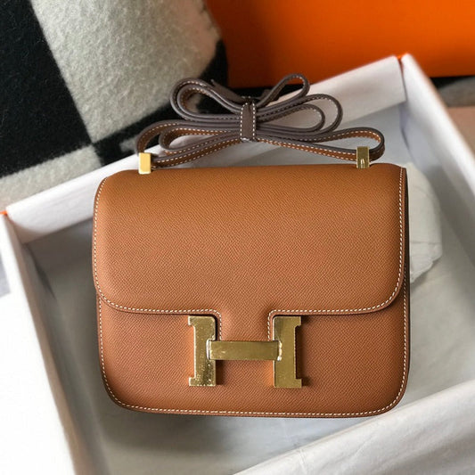 Constance 24 Gold, cuero Epsom, herrajes dorados