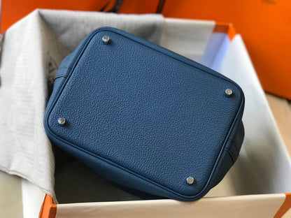 Cerradura picotin, cuero azul Togo, herrajes plateados
