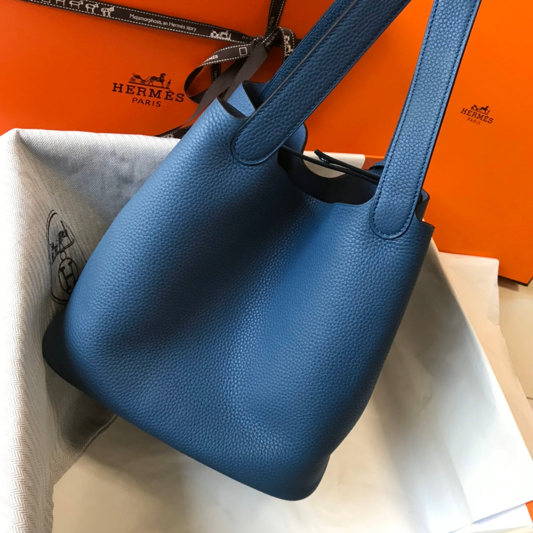 Cerradura picotin, cuero azul Togo, herrajes plateados