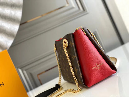 Bolso de hombro Surene BB de 24 cm con cadena y lona monograma de piel de becerro roja