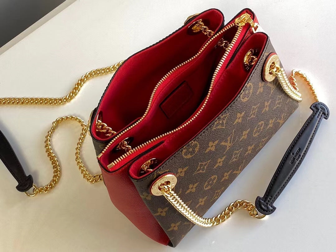 Bolso de hombro Surene BB de 24 cm con cadena y lona monograma de piel de becerro roja