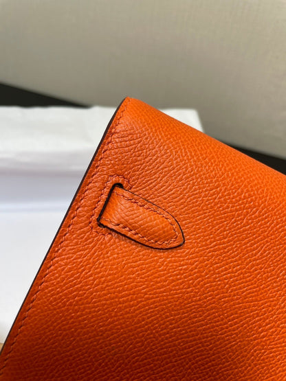 Kelly WOC 20.5 naranja Epsom con herrajes dorados
