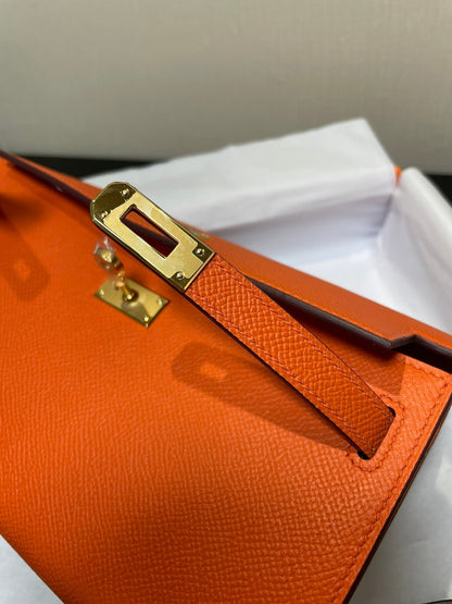 Kelly WOC 20.5 naranja Epsom con herrajes dorados