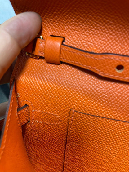 Kelly WOC 20.5 naranja Epsom con herrajes dorados