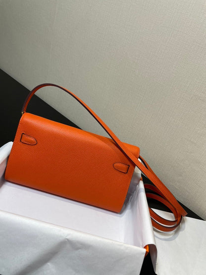 Kelly WOC 20.5 naranja Epsom con herrajes dorados