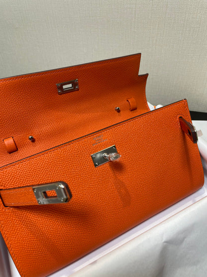 Kelly WOC 20.5 naranja Epsom herrajes plateados