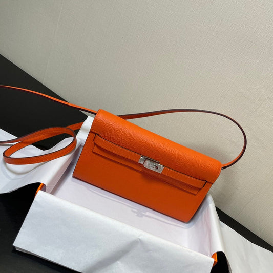 Kelly WOC 20.5 naranja Epsom herrajes plateados