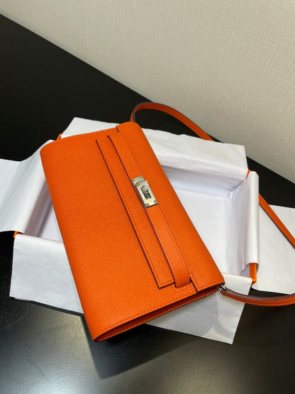 Kelly WOC 20.5 naranja Epsom herrajes plateados