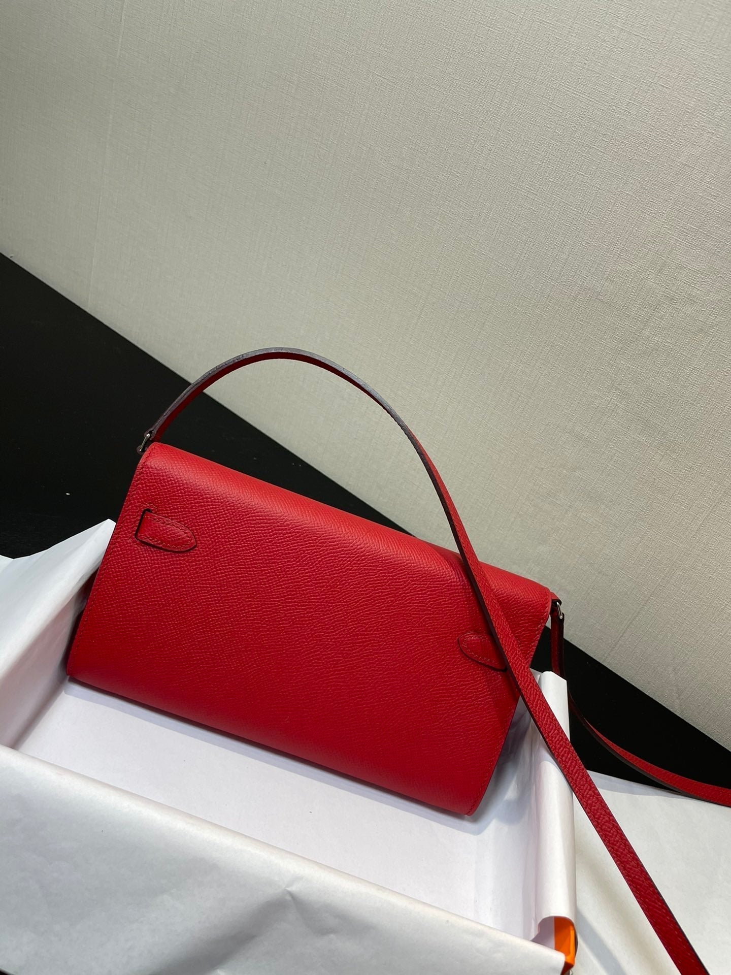 Kelly WOC 20.5 rojo Epsom herrajes plateados