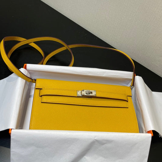 Kelly WOC 20.5 amarillo Epsom herrajes plateados