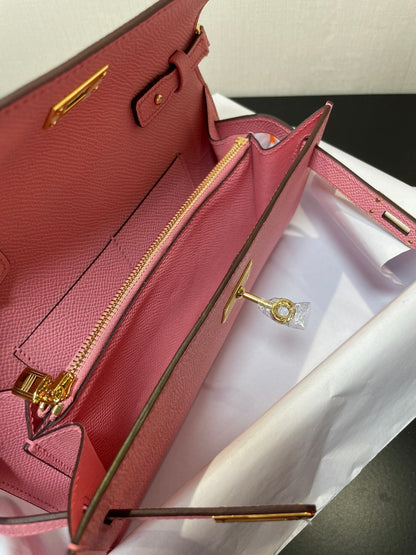 Kelly WOC 20.5 rosa Epsom con herrajes dorados