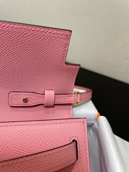 Kelly WOC 20.5 rosa Epsom con herrajes dorados