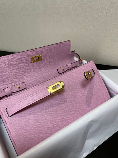 Cartera Kelly To Go de 20,5" rosa claro con herrajes dorados Epsom