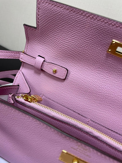 Kelly WOC 20.5 rosa claro con herrajes dorados Epsom