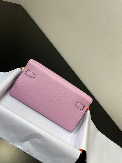 Cartera Kelly To Go de 20,5" rosa claro con herrajes dorados Epsom