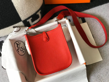Mini Evelyne 18 cm Togo rojo Herrajes plateados