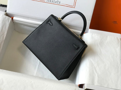 Hm Kelly 32 cm, cuero Epsom negro, herrajes dorados