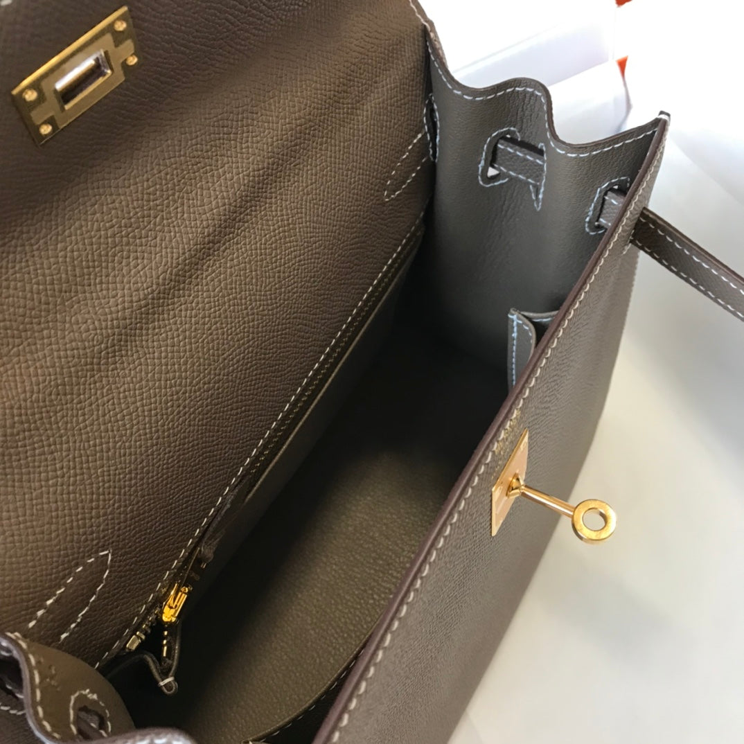 Bolso bandolera hm kelly de 32 cm con herrajes dorados en cuero Epsom