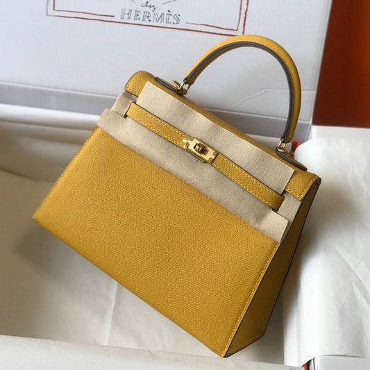 HM Kelly 32 cm, cuero Epsom amarillo, herrajes dorados