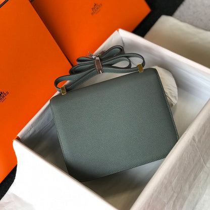 Constance 24 azul naranja, cuero Epsom, herrajes dorados