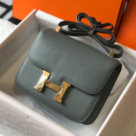 Constance 24 azul naranja, cuero Epsom, herrajes dorados