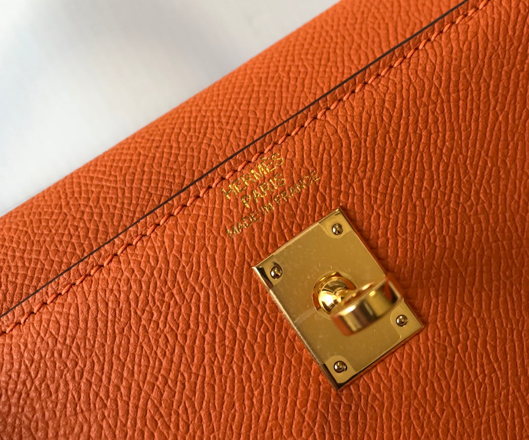 Hm Kelly 32 cm, cuero Epsom naranja, herrajes dorados