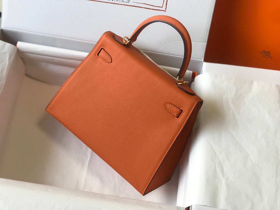 Hm Kelly 32 cm, cuero Epsom naranja, herrajes dorados