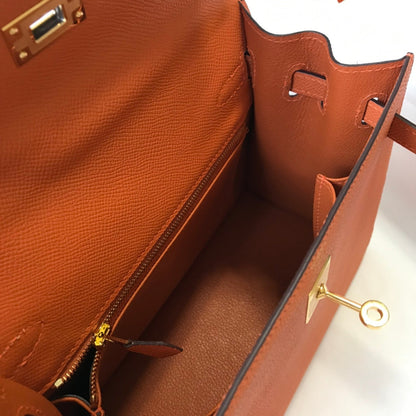 Hm Kelly 32 cm, cuero Epsom naranja, herrajes dorados