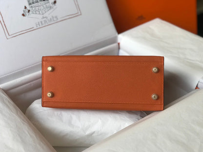 Hm Kelly 32 cm, cuero Epsom naranja, herrajes dorados