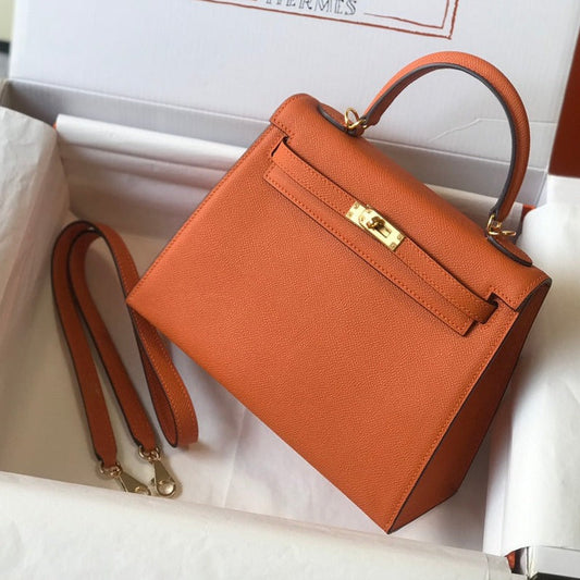 Hm Kelly 32 cm, cuero Epsom naranja, herrajes dorados