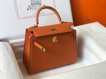 Hm Kelly 32 cm, cuero Epsom naranja, herrajes dorados