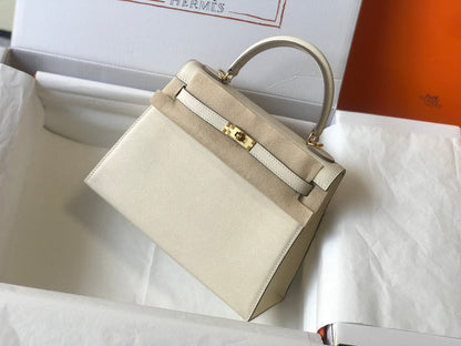 Hm Kelly 32 cm, cuero Epsom blanco, herrajes dorados
