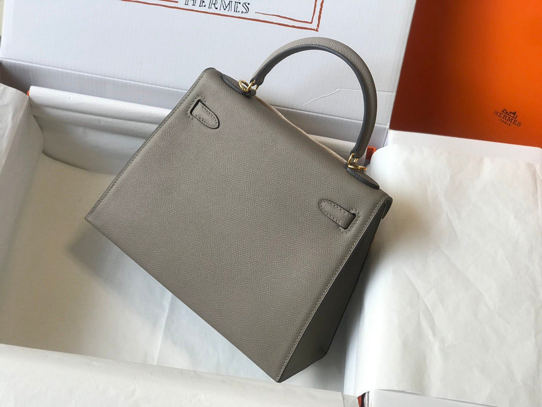 Hm Kelly 32 cm, cuero Epsom gris oscuro, herrajes dorados