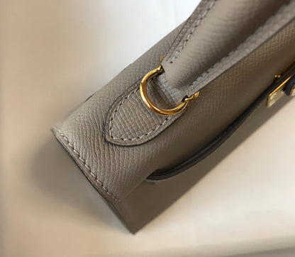 Hm Kelly 32 cm, cuero Epsom gris oscuro, herrajes dorados