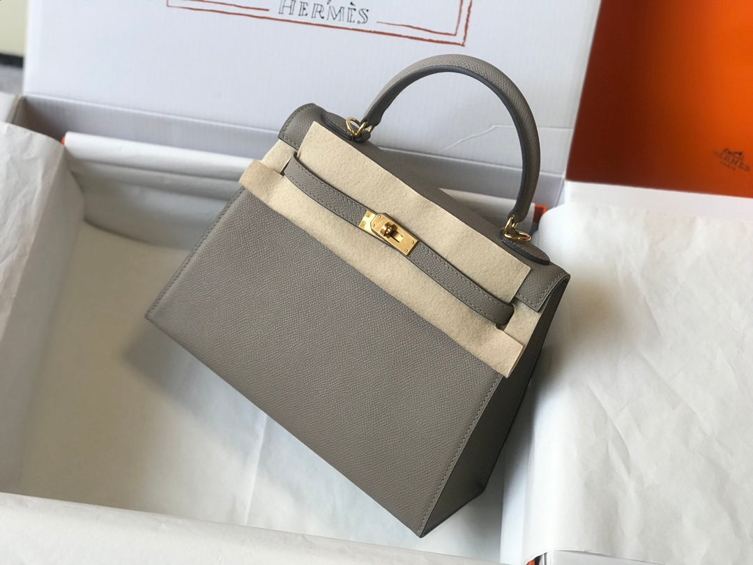 Hm Kelly 32 cm, cuero Epsom gris oscuro, herrajes dorados