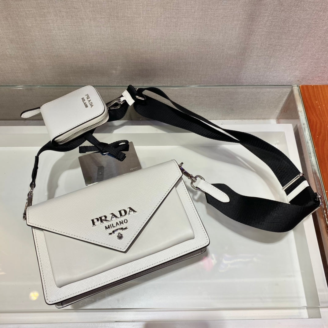 BOLSO SOBRE CON SOLAPA 20 EN PIEL SAFFIANO BLANCA