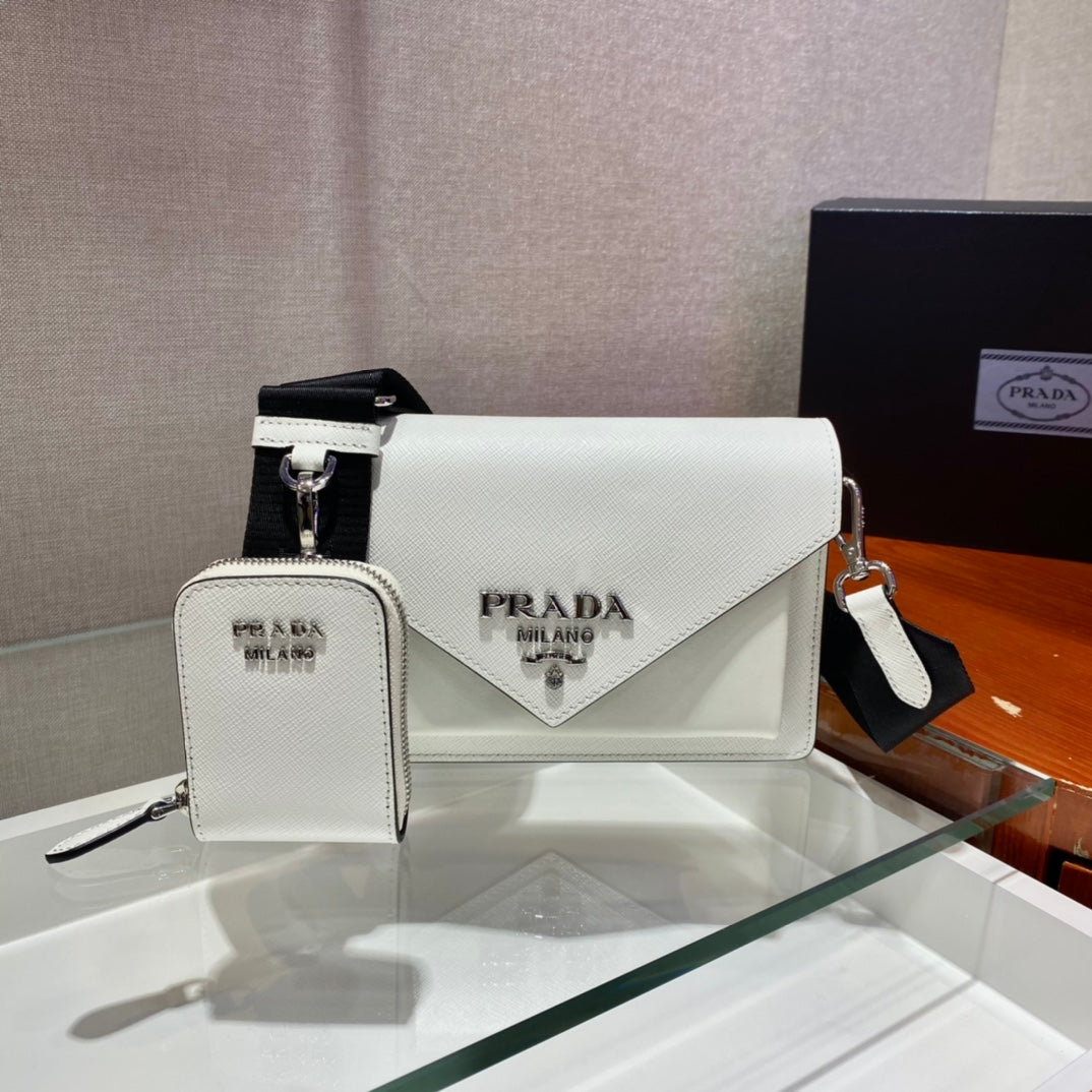 BOLSO SOBRE CON SOLAPA 20 EN PIEL SAFFIANO BLANCA