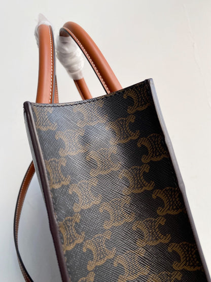 petit cabas vertical 28 cm toile triomphe noire cuir de veau beige