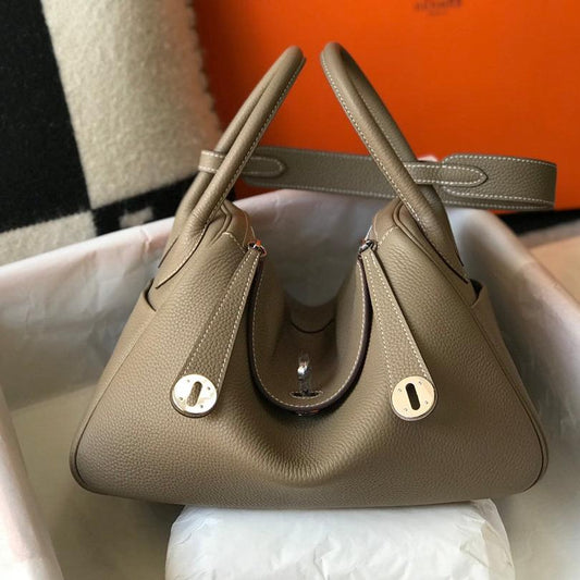 BOLSO HM LINDY 30 CAQUI TAUILLON PIEL CLEMENCE