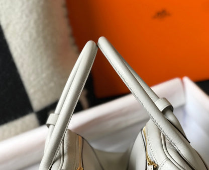 BOLSO HM LINDY 30 CREMA CUERO TAURILLON CLEMENCE