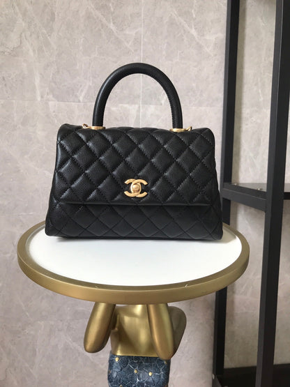 Mango superior de caviar coco acolchado negro con herrajes dorados 24 