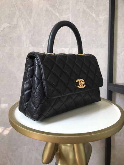 Mango superior de caviar coco acolchado negro con herrajes dorados 24 