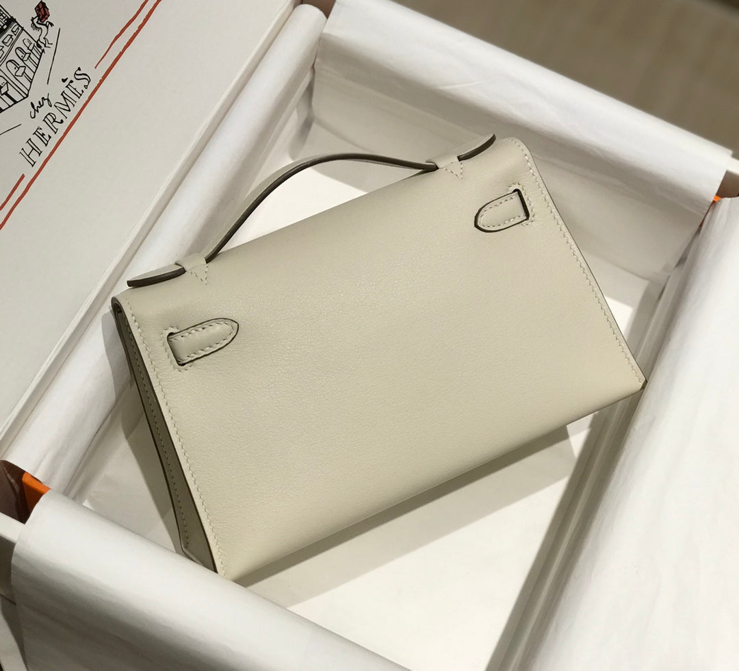 POCHETTE HM KELLY 22 CM BLANC BEIGE SWIFT QUINCAILLERIE OR