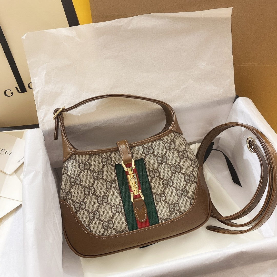 BOLSO DE HOMBRO JACKIE 1961 PEQUEÑO 28 EN LONA BEIGE Y PIEL DE BECERRO MARRÓN