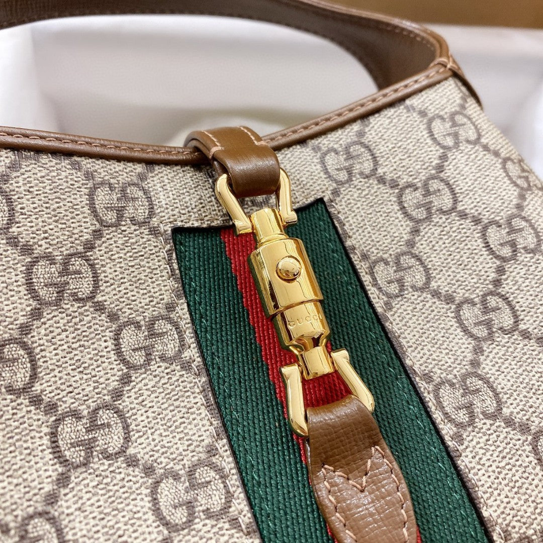 BOLSO DE HOMBRO JACKIE 1961 PEQUEÑO 28 EN LONA BEIGE Y PIEL DE BECERRO MARRÓN