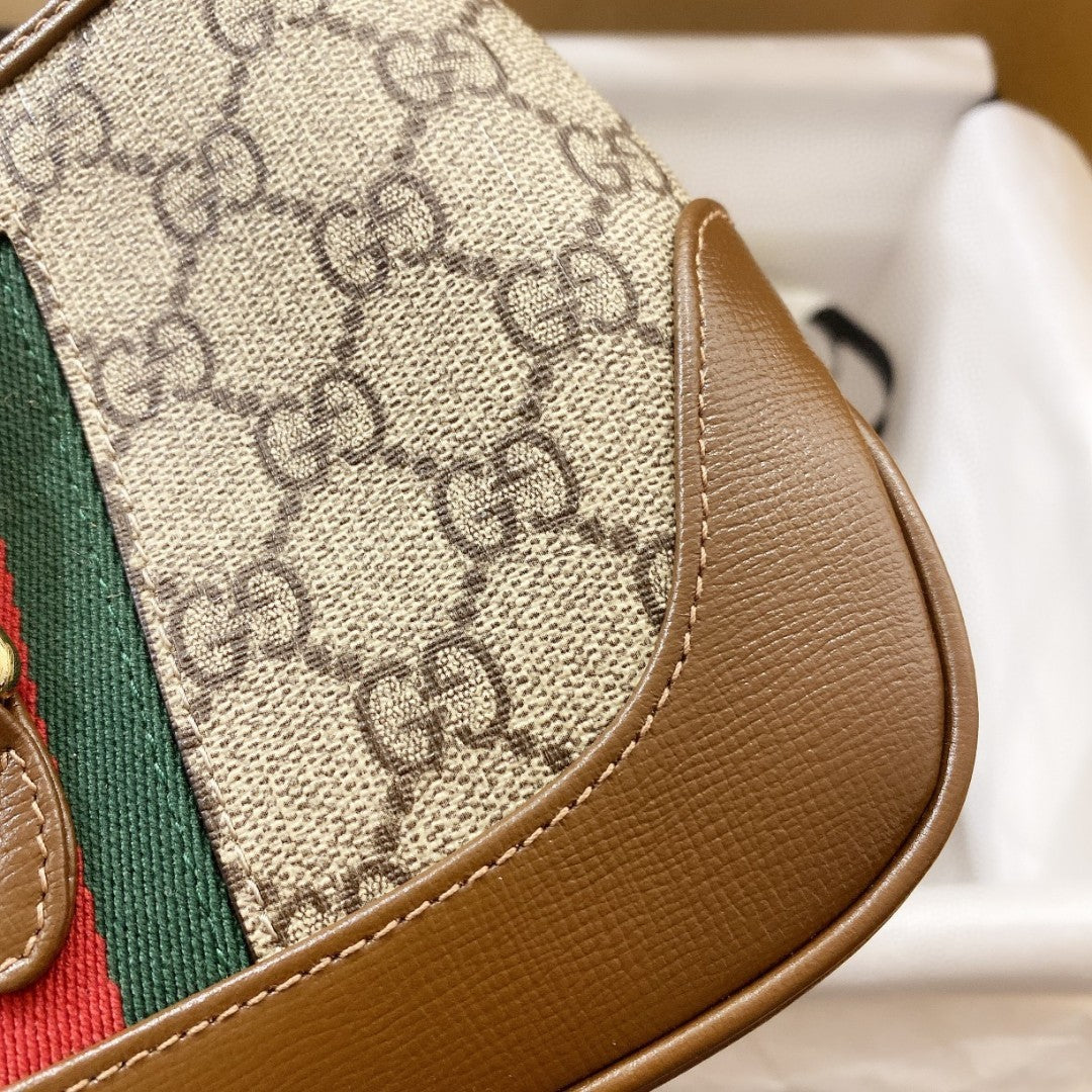 BOLSO DE HOMBRO JACKIE 1961 PEQUEÑO 28 EN LONA BEIGE Y PIEL DE BECERRO MARRÓN