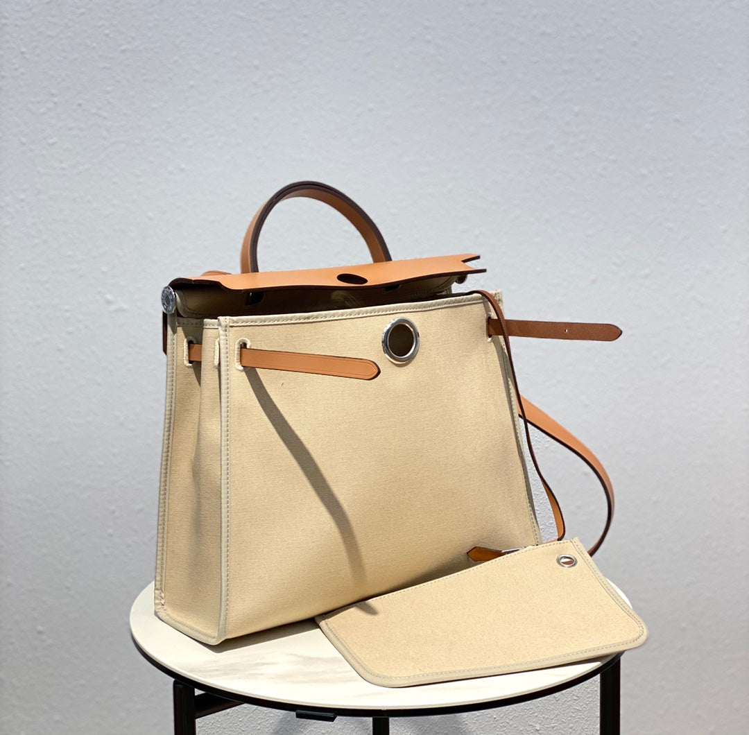 Herbag 31 Toile Lona Beige Claro Piel de Vaca Dorada